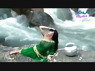 Desi girl in transparent wet saree showing boobs..hot show