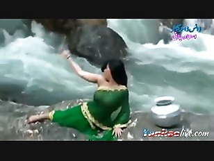 Desi girl in transparent wet saree showing boobs..hot show